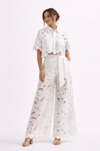 Floral lace women's set featuring a short sleeve blouse and wide leg pants, perfect for stylish summer outfits. 3