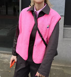 Lambswool vest with button front in slim fit, showcasing a stylish design and cozy texture, perfect for layering in cooler weather. 5