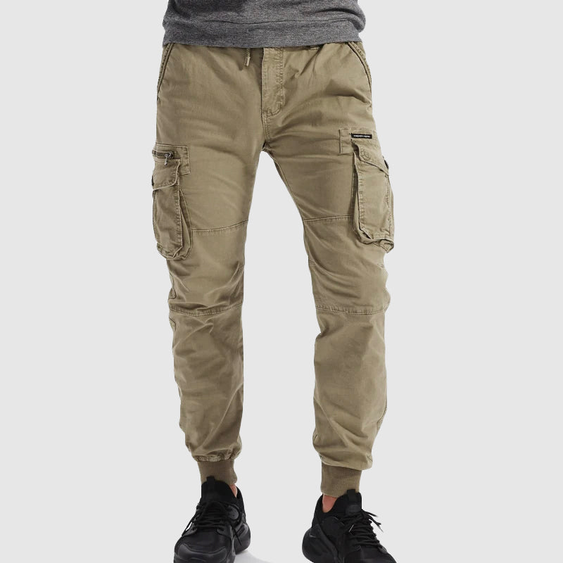 Men's cargo joggers pants designed for outdoor activities, featuring multiple pockets, a comfortable fit, and durable fabric for versatility and style. 1