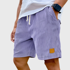 Men's relaxed fit textured summer shorts in a light color, perfect for casual occasions. Featuring a comfortable waistband and stylish design, ideal for warm weather outings 5