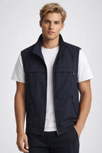 Men's lightweight vest featuring zippered pockets and a structured collar, ideal for outdoor activities and casual wear. 3