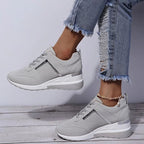 Orthopedic women's sneaker featuring arch support and cushioning for enhanced comfort and stability during daily activities. 0