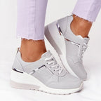 Orthopedic women's sneaker featuring arch support and cushioning for enhanced comfort and stability during daily activities. 3