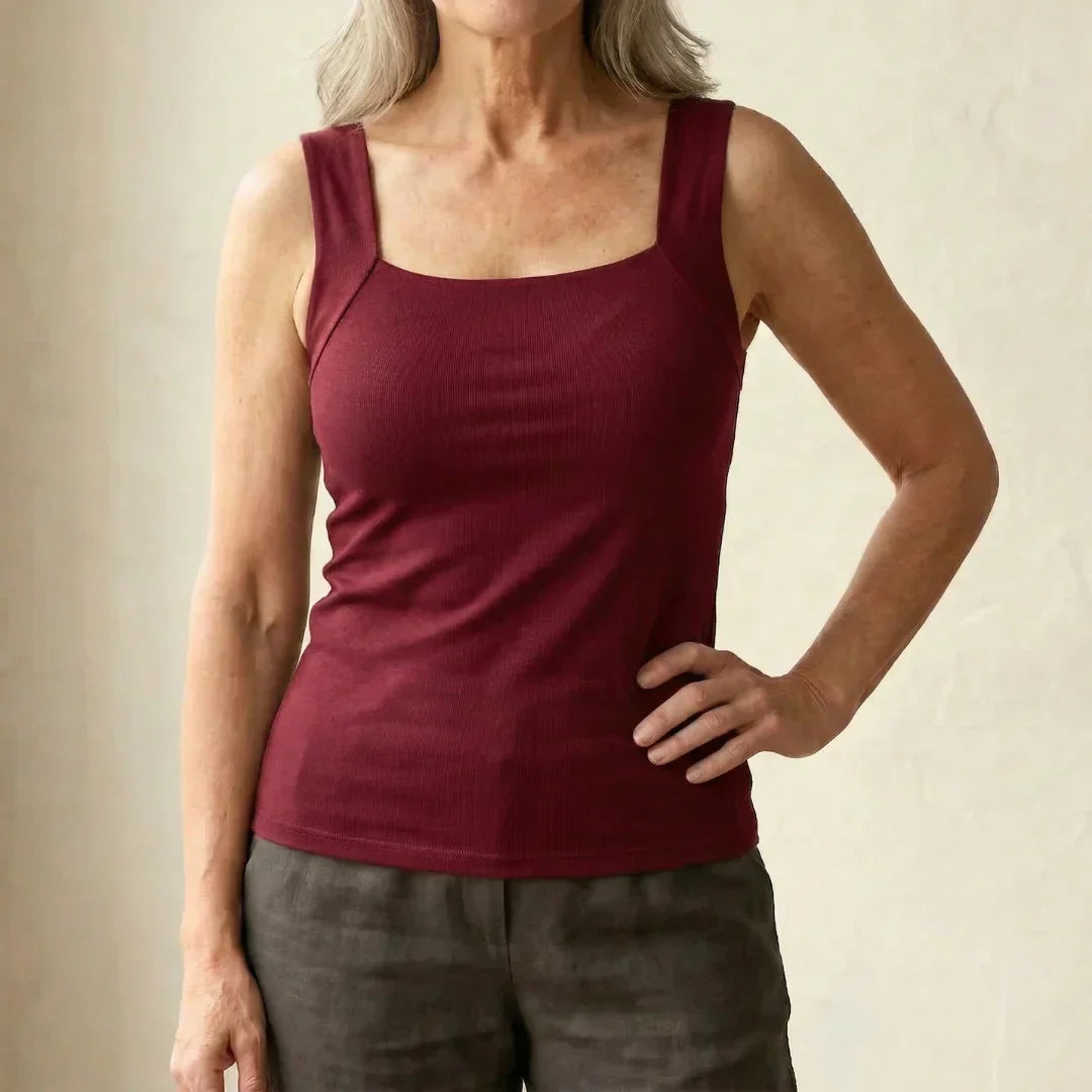 Women’s tank top featuring a built-in bra, designed with breathable fabric for ultimate comfort and support during workouts or casual wear. 13