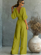 V-Neck jumpsuit for women featuring a tailored fit and luxurious silk-touch fabric, perfect for elegant occasions and stylish outings. 7