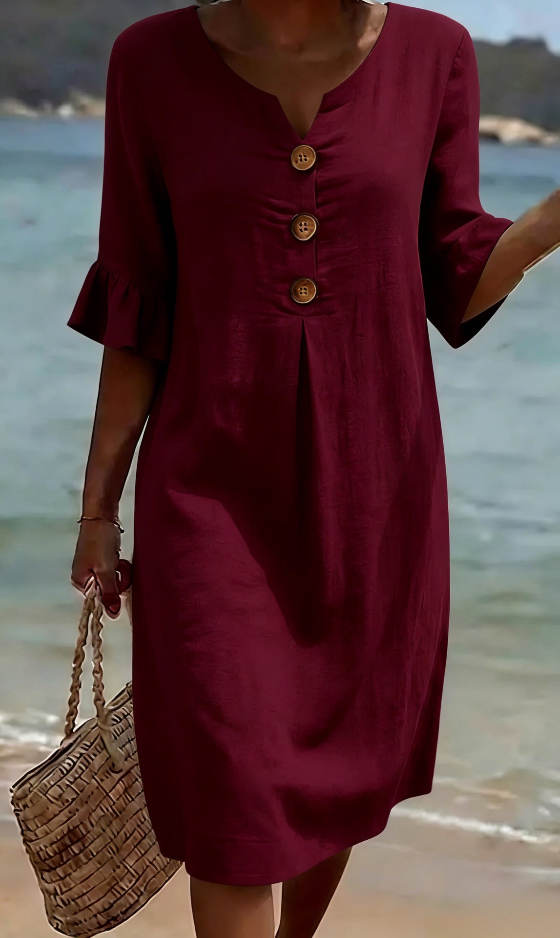 White summer dress featuring ruffled sleeves, made from a soft cotton-linen blend, perfect for warm weather outings and casual occasions. 9