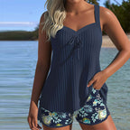 Women's modern tankini swimwear featuring a stylish design, perfect for beach days, showcasing vibrant colors and a flattering fit. 0