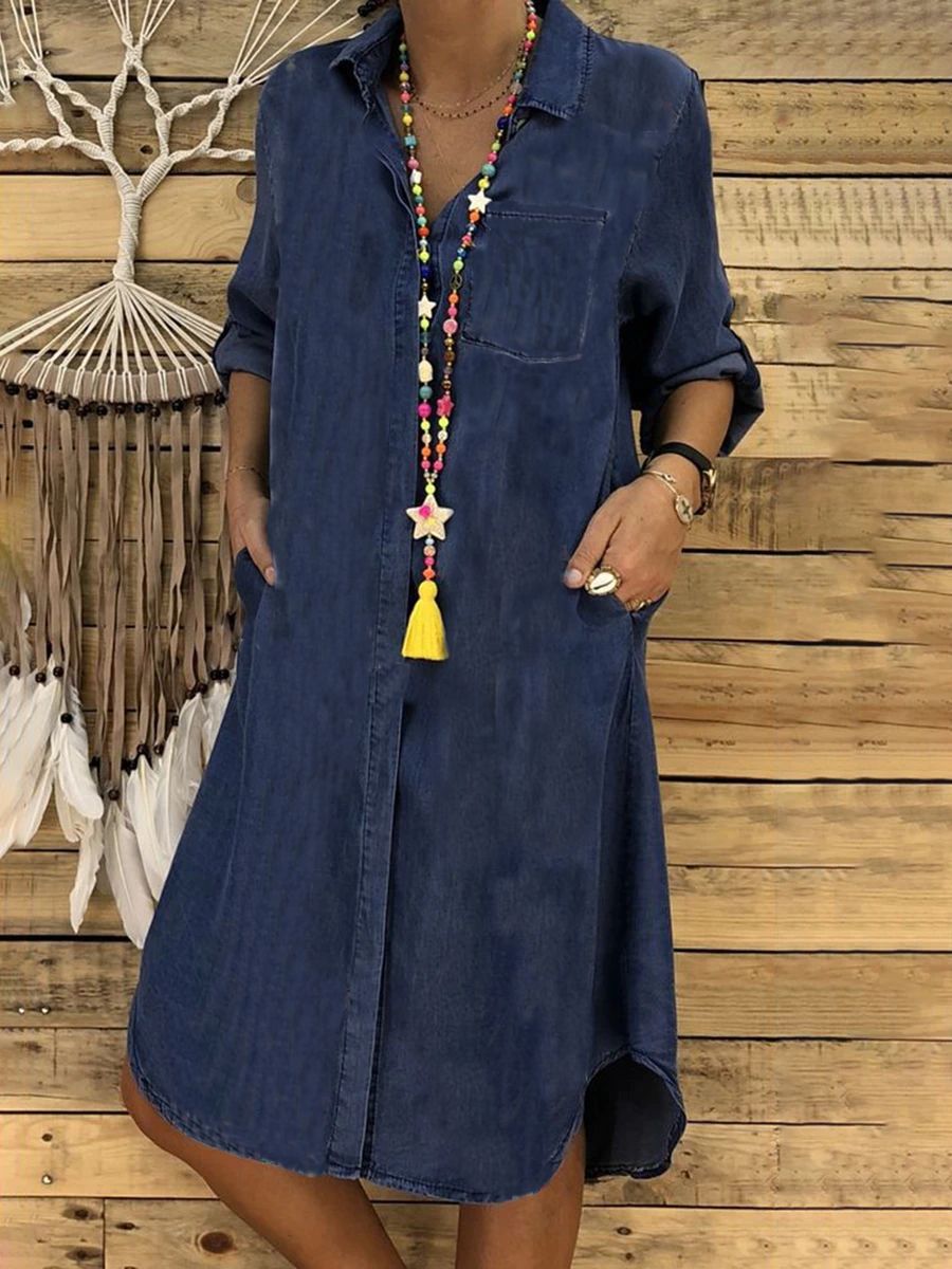 Women's relaxed fit denim shirt dress in a casual style, perfect for everyday wear, featuring a flattering silhouette and versatile design. 2