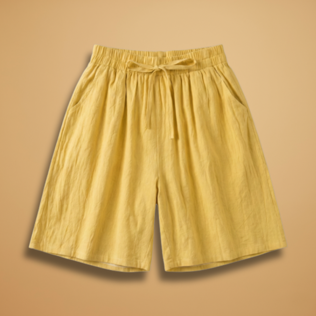 Women's relaxed fit knee-length shorts in a stylish design, perfect for casual outings and summer wear. 1