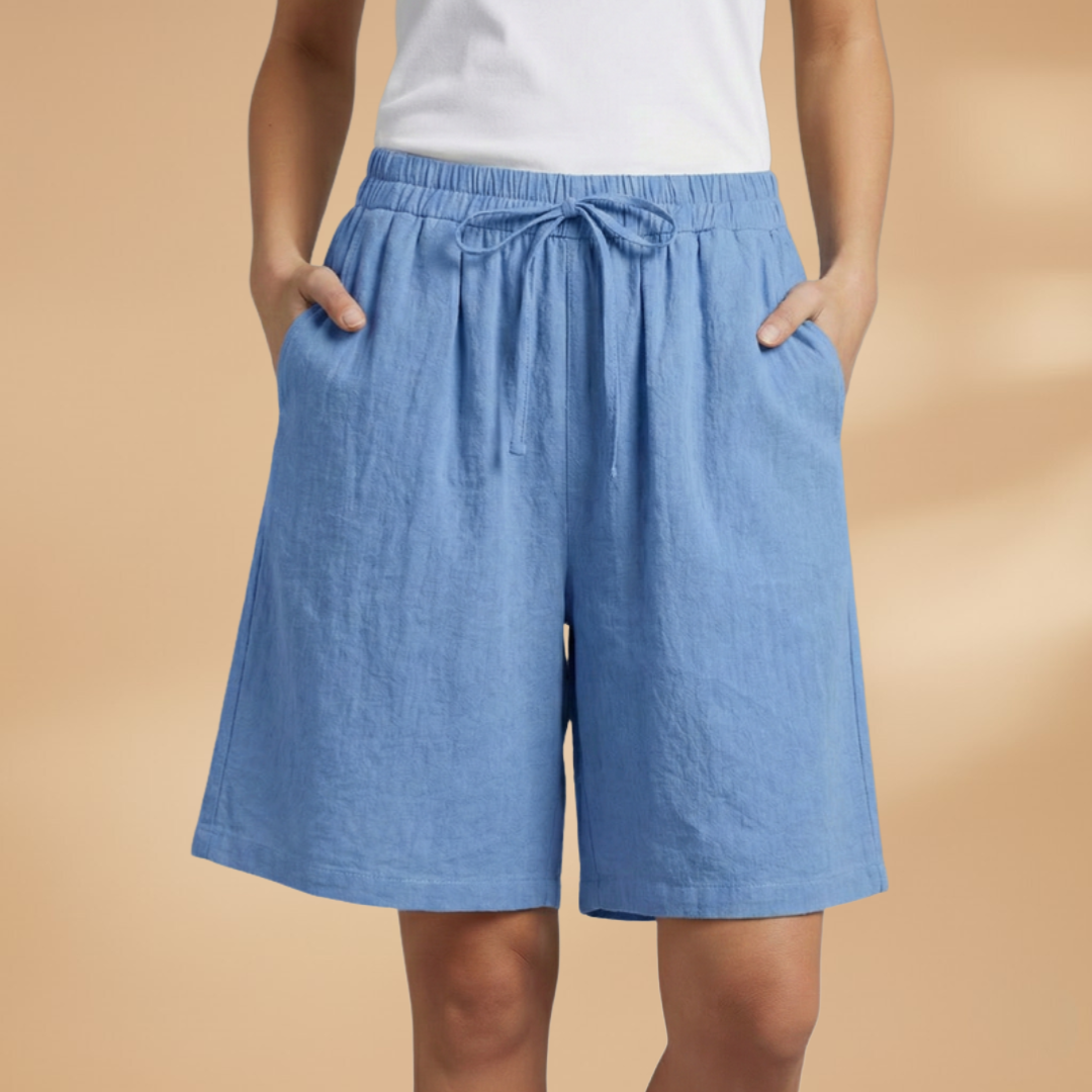 Women's relaxed fit knee-length shorts in a stylish design, perfect for casual outings and summer wear. 16