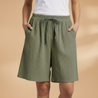 Women's relaxed fit knee-length shorts in a stylish design, perfect for casual outings and summer wear. 7