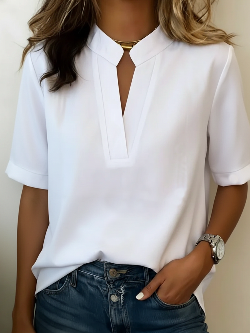 Women's relaxed fit V-neck blouse in a lightweight fabric, perfect for summer wear, featuring short sleeves and a comfortable, casual style ideal for everyday outfits. 6