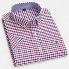 Women's short sleeve oxford shirt in a light and breathable fabric, perfect for casual summer outings, featuring a classic collar and a relaxed fit for comfortable wear 0