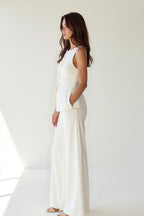 Women's sleeveless set featuring a stylish top and flowy wide-leg pants, perfect for summer outings and casual wear. 1
