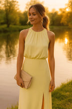Women's slim fit midi dress featuring a sleeveless design and high neckline, perfect for summer occasions. 2